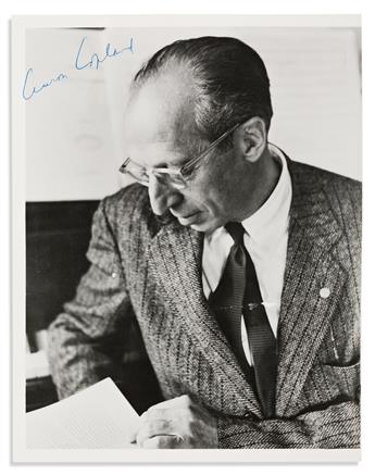 COPLAND, AARON. Two items: Photograph Signed * Typed statement Signed.